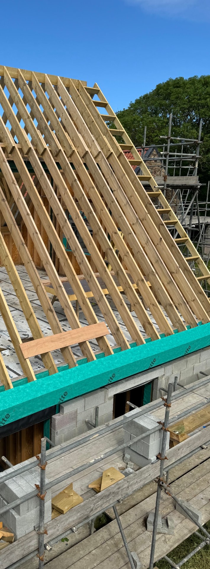 Rafters and eaves detail on the newbuild roof from the scaffold