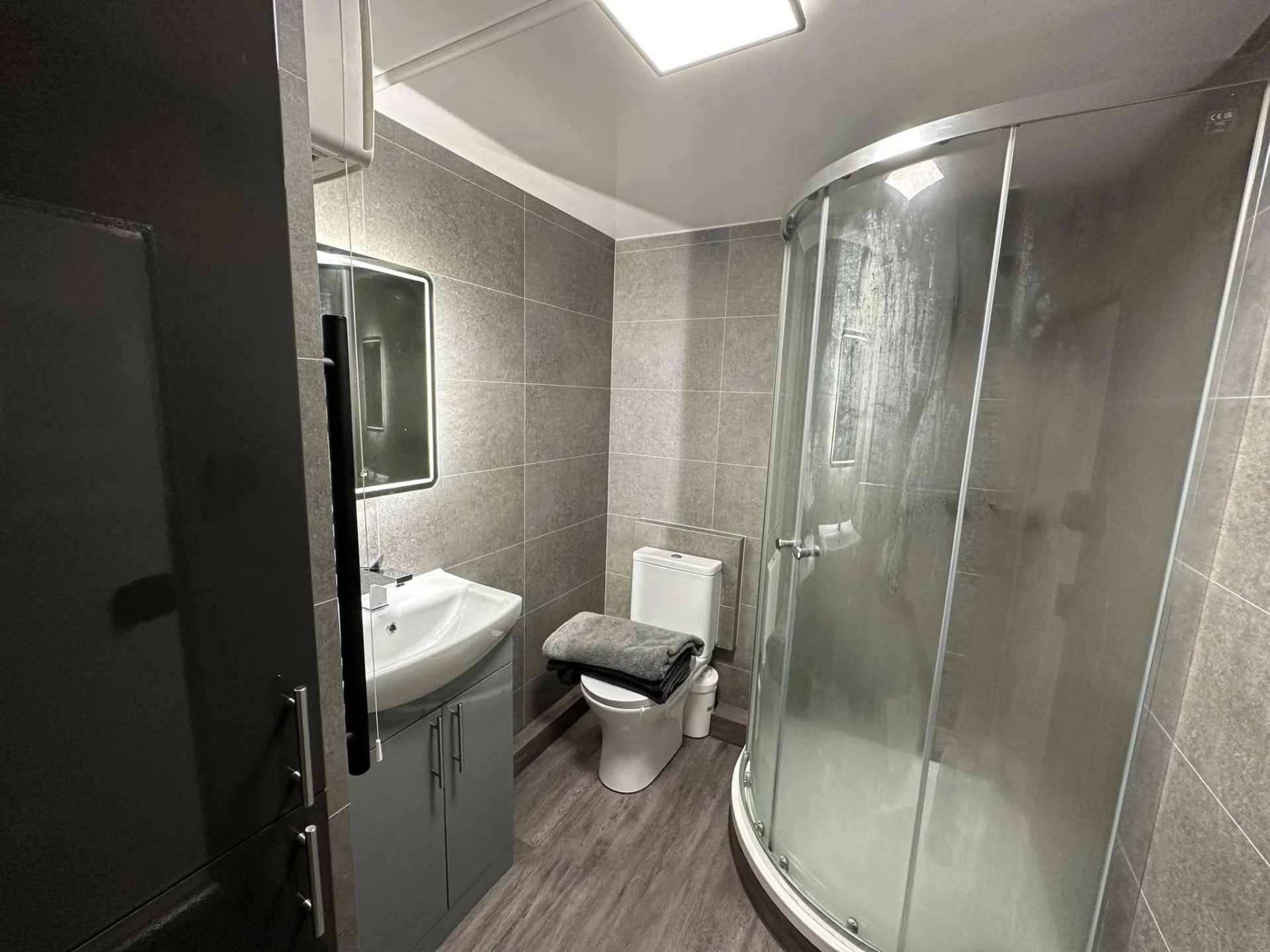 A modern tiled bathroom refitted by Timber Craft Developments